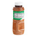 A plastic bottle of Tajin Classic Seasoning with a label.