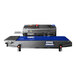 A blue and silver Sealer Sales band sealer machine with a blue belt.