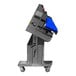 A blue Sealer Sales band sealer with vacuum, tilt head, and dry ink coding on wheels.