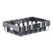 A black plastic container with four compartments and holes.