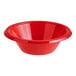 A red Choice plastic bowl on a counter.