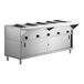 A large stainless steel ServIt electric steam table with three open wells.