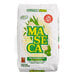 A white bag of Maseca Traditional Corn Masa Flour with green and yellow text on a white surface.