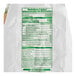 A white bag of Maseca Traditional Corn Masa Flour with green text and a nutrition label.