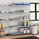 Regency galvanized steel shelves in a school kitchen.