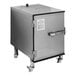 A stainless steel SmokinTex 1100 Pro Series Electric Smoker on wheels with a door.