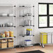 Regency galvanized steel shelves in a school kitchen.