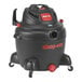 A Shop-Vac wet/dry utility vacuum with a red handle and black wheels.