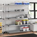 Regency galvanized steel shelving in a school kitchen.