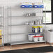 A stainless steel wire shelf kit with solid stainless steel shelves.