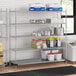 A Regency metal wire shelf kit with a white container on the bottom shelf.