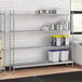 A stainless steel wire shelf kit with solid stainless steel shelves and poles.