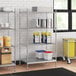 A stainless steel wire shelf kit with containers on the bottom shelf.