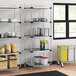 Regency galvanized steel shelves in a kitchen with food and containers.