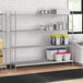A stainless steel wire shelf kit with 4 solid stainless steel shelves.