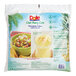 A bag of Dole Chef-Ready Cuts IQF Cubed Pineapple on a white surface.