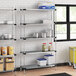 Regency galvanized steel shelves in a school kitchen.