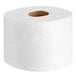 A Charmin Essentials Mega Roll of toilet paper on a white background.