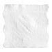 A white Charmin Ultra Soft toilet paper sheet with a torn edge.