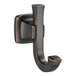 An American Standard Townsend Legacy Bronze double robe hook with black accents.
