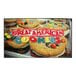 A group of cookies with a red and white sign on a brown surface.