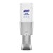 A Purell hand sanitizer dispenser with a silver and clear body.