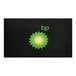 A black M+A Matting SuperScrape Impressions mat with a yellow and green flower.