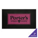 A black rectangular mat with a pink sign and black text that says "Porter's Steak Chops"