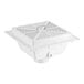 A white square floor drain with a metal grate.