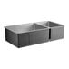 An American Standard stainless steel undermount sink with two compartments.