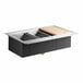 An American Standard stainless steel sink with a wooden workstation board.