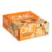 A box of 12 ONE Coffee Shop Caramel Macchiato Protein Bars.