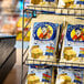 A rack of Pirate's Booty white cheddar rice and corn puffs bags.