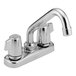 A Delta chrome deck-mount laundry faucet with blade handles and a swing spout.