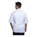 A man wearing a Uncommon Chef white short sleeve chef coat with white mesh back.