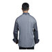 The back of a man wearing a grey Uncommon Chef coat with a mesh back.
