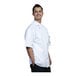 A man wearing a white Uncommon Chef chef coat.