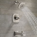 The Delta Ashlyn stainless steel bath and shower trim kit with a metal knob.