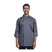 A man wearing a Uncommon Chef Pisa slate long sleeve chef coat with slate mesh back.