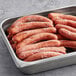 A pan filled with Vienna Beef Natural Casing Beef Franks.