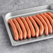 A tray of Sabrett natural casing beef hot dogs.