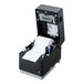 A black Star mC-Label3 printer with a roll of paper in it.