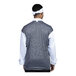 A man wearing a white Uncommon Chef Roma Chef Coat with a black and white mesh back.