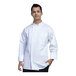 A man wearing a white Uncommon Chef long sleeve chef coat with white mesh on the back.