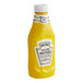 A yellow bottle of Heinz Yellow Mustard.