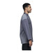 A man wearing a Uncommon Chef split 3/4 sleeve chef coat with a grey mesh back.