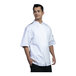 A man wearing a white Uncommon Chef short sleeve chef coat with black accents.