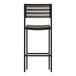 A gray stackable bar stool with a black frame and faux teak slats.