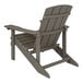 A gray wooden Adirondack chair.