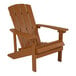 A brown teak Adirondack chair with armrests.